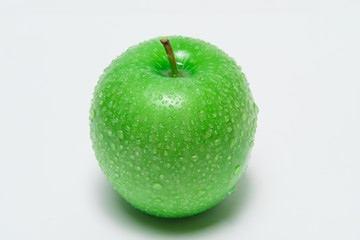 Closeup green apple with water-drops
