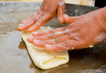 A woman preparing a cake in Tunisia