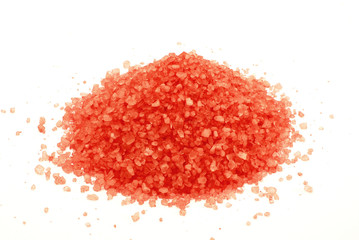 Red sea salt isolated on white