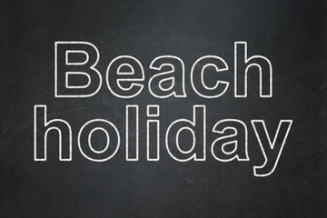 Vacation concept: Beach Holiday on chalkboard background