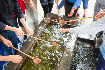 Water purification at entrance of the Japanese temple - obrazy, fototapety, plakaty