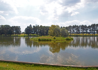 Fototapeta na wymiar Pond on a summer day near the Mir Castle, Belarus