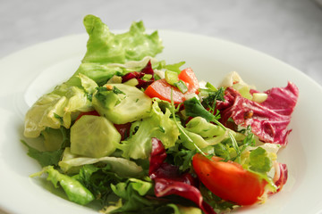 plate of fresh salad. Bon appetit