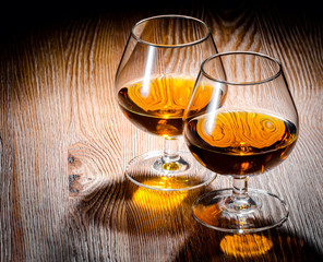 Whiskey or brandy on a wooden table