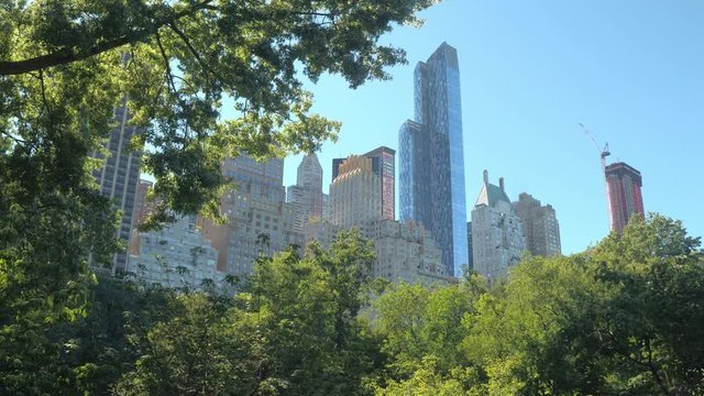 LOW ANGLE: Modern glassy skyscrapers and luxury blocks of flats in New York