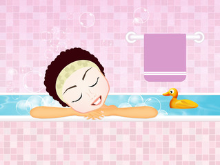 girl relaxes in the bath