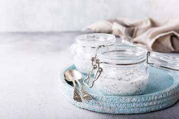 Chia seed pudding in glass jar. Superfoods concept with copy space.