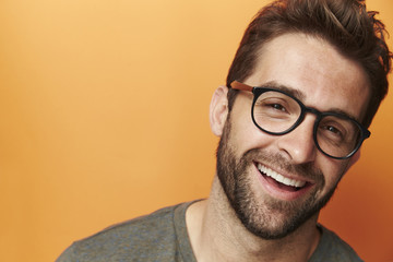 Laughing man in spectacles, portrait