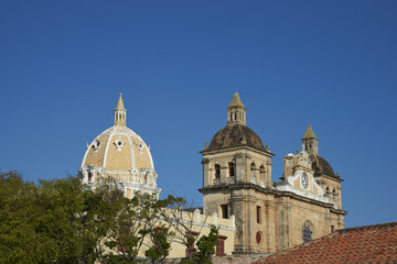 Towers and dome of the historic Iglesia de San Pedro Claver in the Spanish colonial city of Cartagena in Colombia.