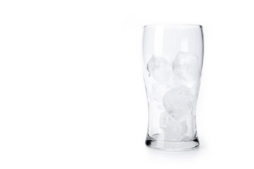 Glass with ice isolated on white background.