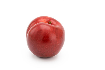 Ripe plum on a white