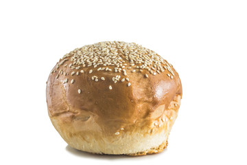 a bun topped with sesame seeds