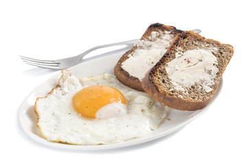 cooked fried eggs with toasted bread