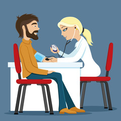 Doctor measures the pressure of the patient.