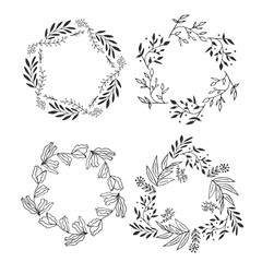 Set of floral vine wreaths. Hand drawn vector illustration. Flowers and laurels doodle.