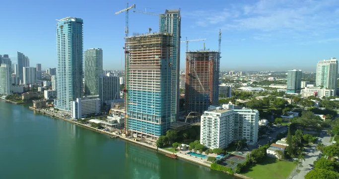 Aerial drone footage of highrise architecture construction sites at Edgewater Miami