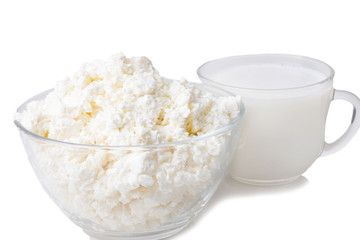 sweet fresh loose sour milk cheese in a glass bowl with milk