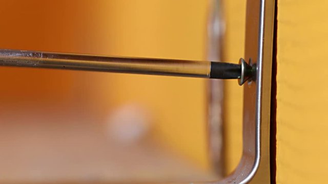 Unscrewing a metal consol