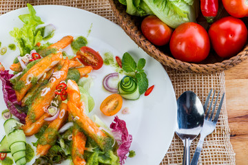 Crab-stick Salad, closeup crab salad with parsley decorated back