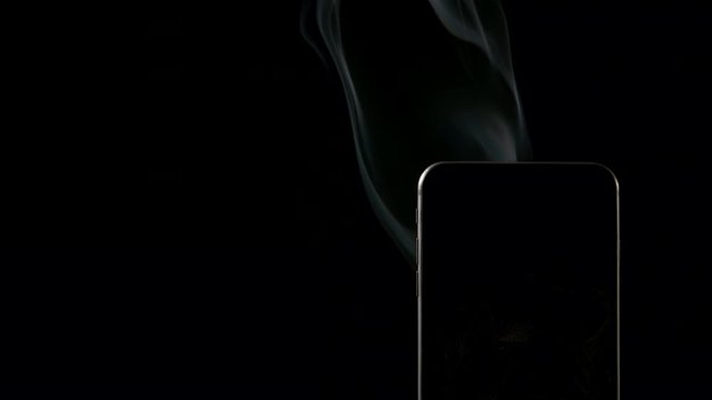 SLOW MOTION: Elegant smoke from smartphone - Right