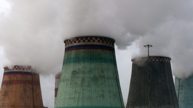 steam coming out of the cooling towers of thermal power plants