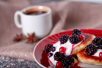 coffee and pancakes with berries