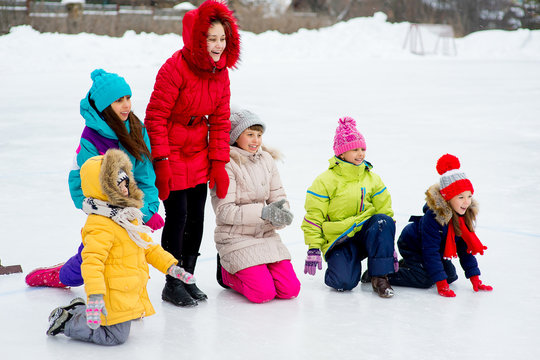 Young girls playing curling