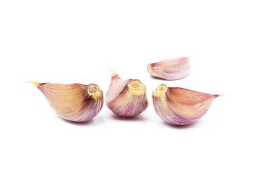 Healthy fresh garlic cloves isolated on white background