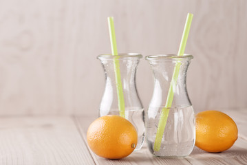 Bottle Soda with lemon on wooden background