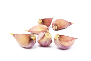Healthy fresh garlic cloves isolated on white background