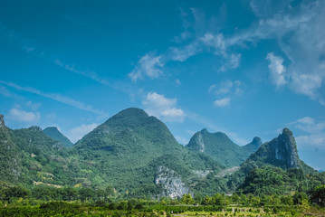 The mountains and countryside scenery with blue sky