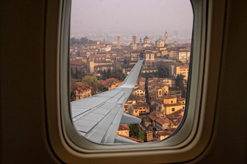 Fototapeta na wymiar view from an airplane window on the Citta Alta in Bergamo