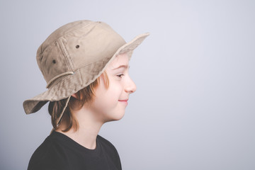 young boy scout sideways portrait with copy space - vintage style photo
