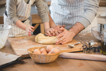 A father and his son cooking