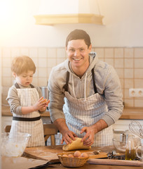 A father and his son cooking