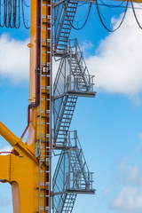 Fototapeta na wymiar Ladder up Shipping Crane