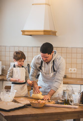 A father and his son cooking