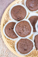 Fototapeta na wymiar Chocolate cupcakes muffins on the plate