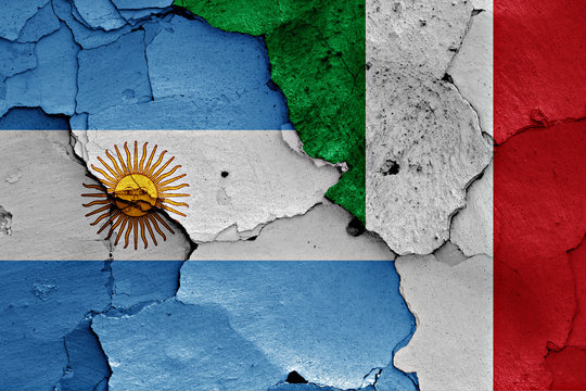 flags of Argentina and Italy painted on cracked wall