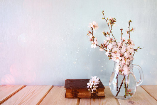 spring white flowers on wooden table