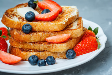 French toast with berries. Love for a healthy desserts concept.