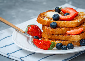 French toast with berries. Love for a healthy desserts concept.