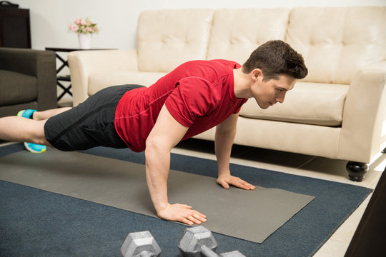 Man Doing Push Ups At Home