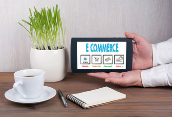 E commerce concept. Digital tablet computer in male hands.