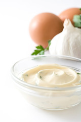 Aioli sauce and ingredients isolated on white background
