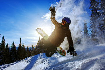 Snowboarder jumping