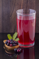 Fruits of wild grapes on different backgrounds (Vaccinium meridionale)