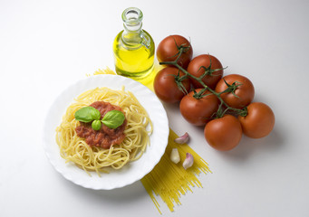 dish with spaghetti and tomato sauce