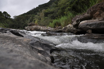 Fototapeta na wymiar Encounter of Rivers Bonito e Macaé located in the The Parque Estadual dos Três Picos (State Park of the Three Peaks) in the district of Lumiar, municipality of Nova Friburgo, Rio de Janeiro Brazil