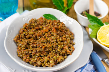 Lentil stew in tomato sauce with cinnamon and spices